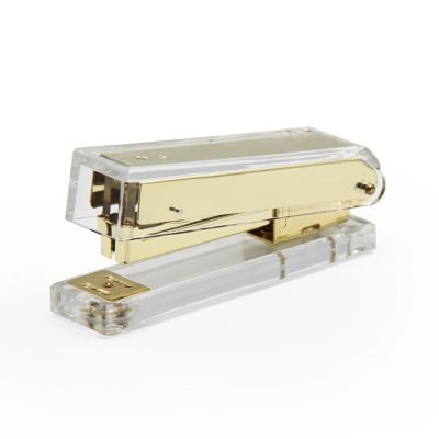 Upgrade your desk with the best Fine Living Acrylic Stapler in gold. Sleek, durable, and perfect for modern workspaces. Shop now at My Kleine Winkel!